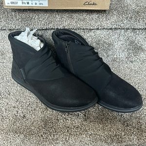 Clarks. 8.5. New in box. Black booties.